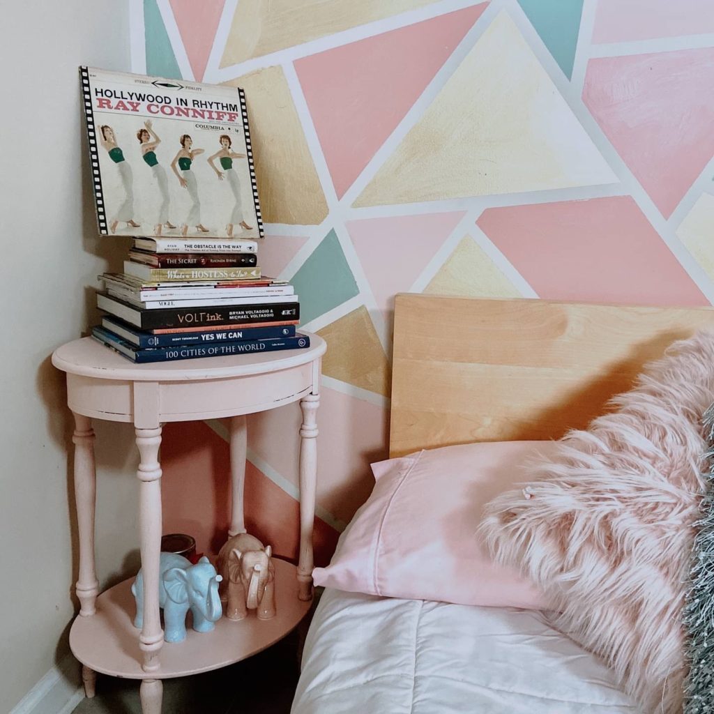 accent wall, pink nightstand 