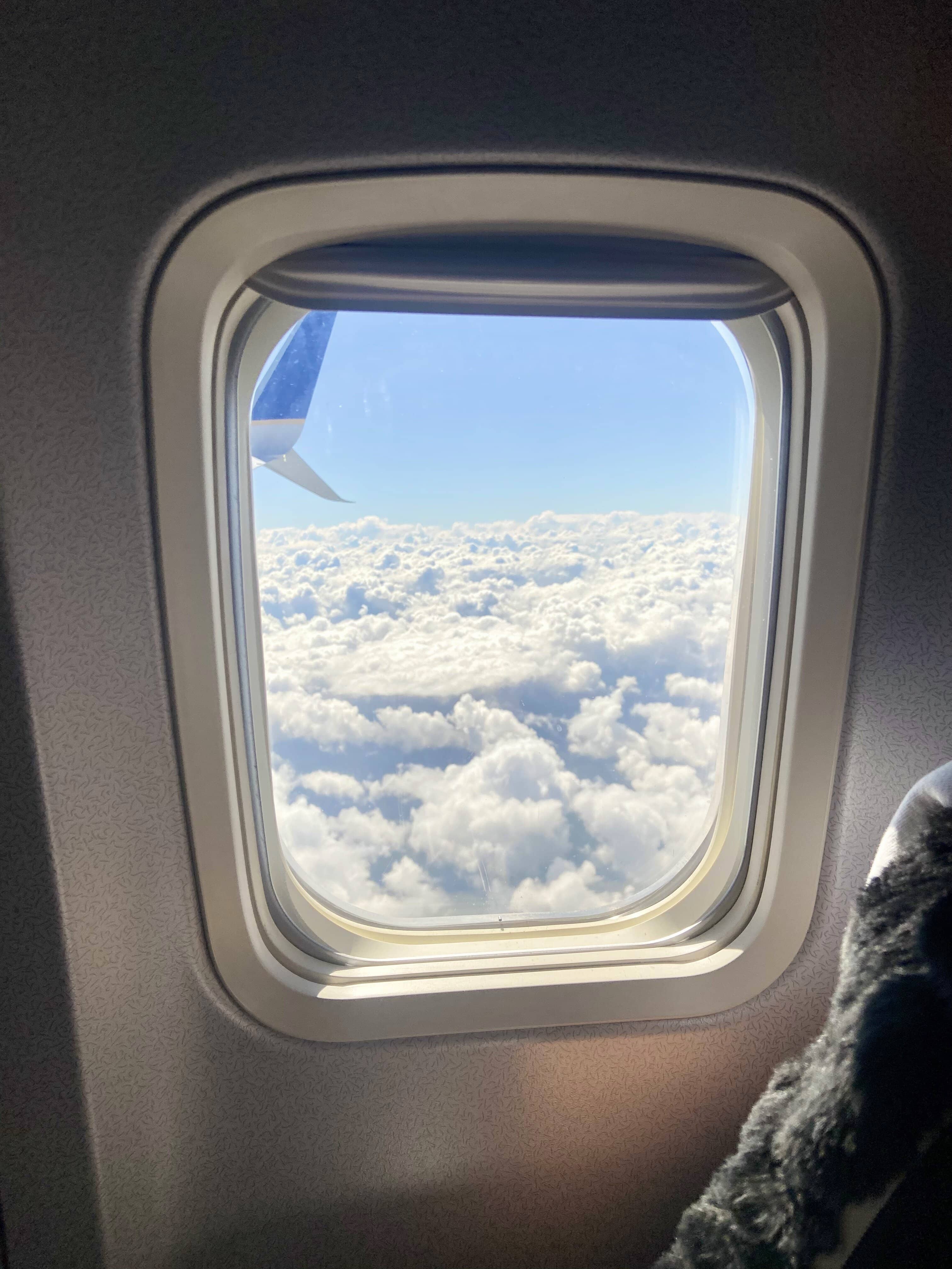 traveling during a pandemic, window views, sky 